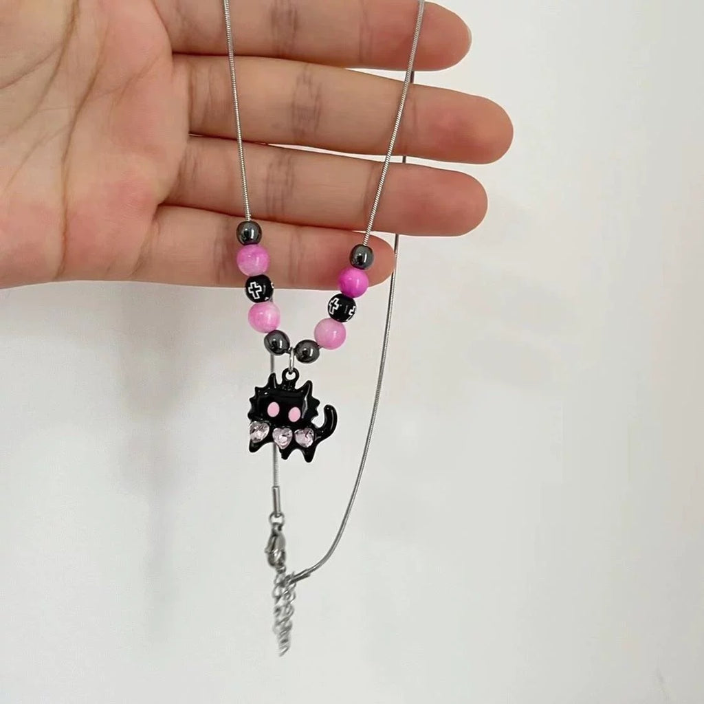 Damen Halskette mit verspieltem Katzenanhänger und bunten Perlendetails Shop Nory