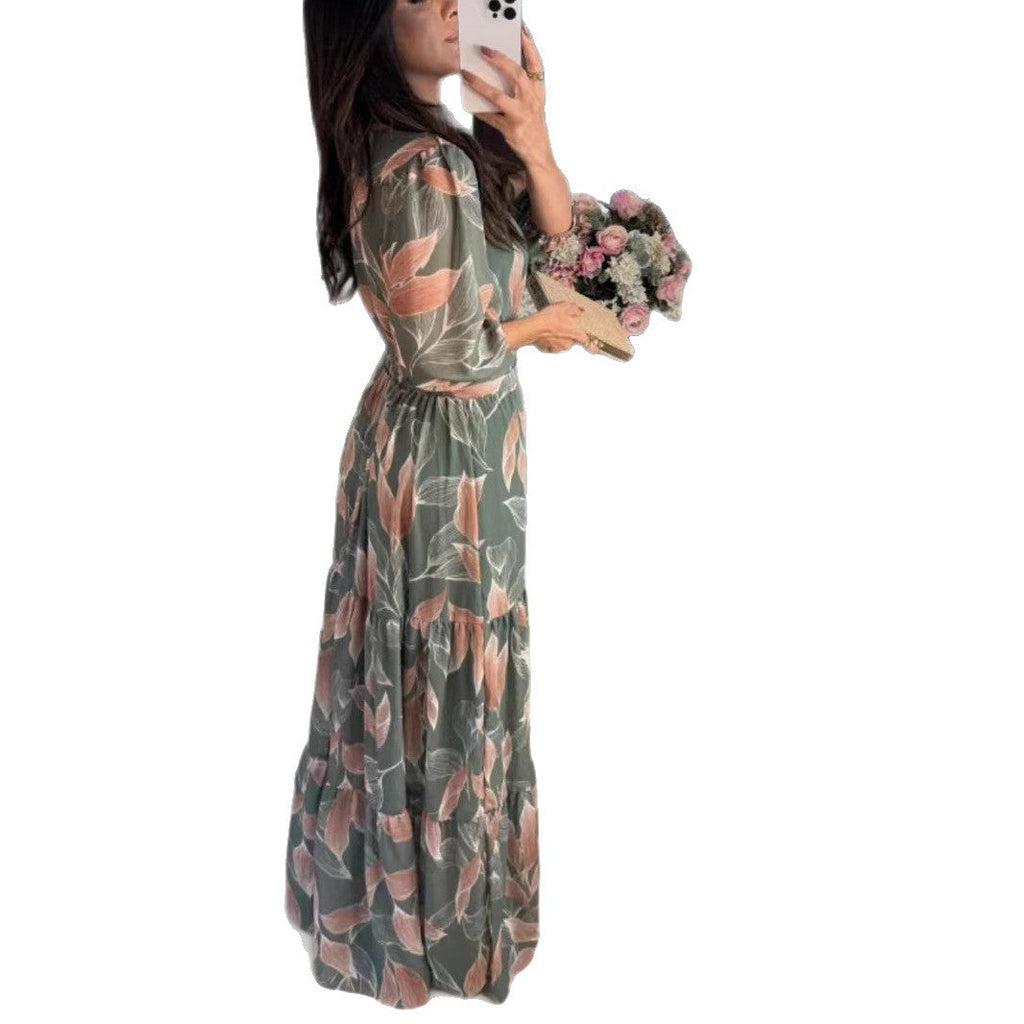 Damen Maxikleid mit buntem Blattmuster und tailliertem Gürtel