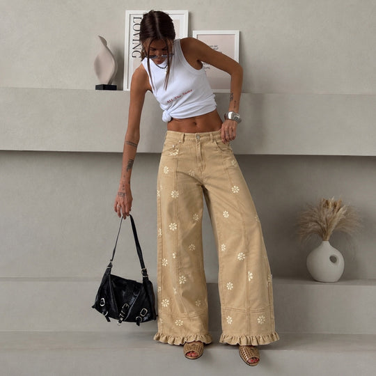 Damen weite Denimhose mit Gänseblümchen-Print, hohem Bund und Rüschenabschluss Shop Nory