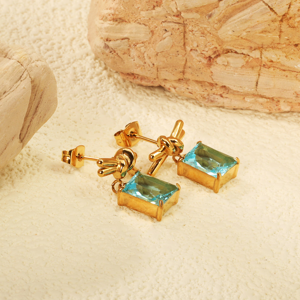 Damen Ohrringe mit funkelndem rechteckigem Zirkonia-Anhänger und eleganter Goldbeschichtung Shop Nory