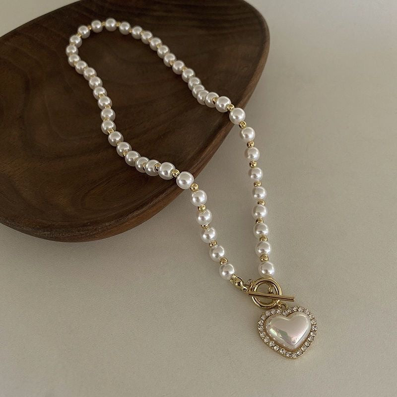 Damen Halskette mit klassischem Perlen-Design und Herzanhänger Shop Nory