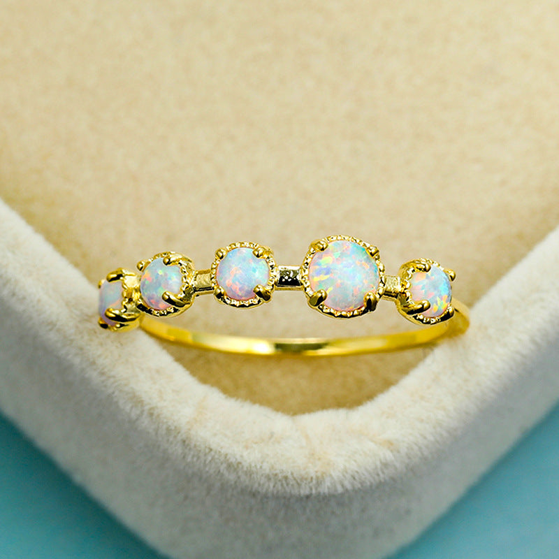Damen Ring mit schimmerndem Opalmuster und eleganter Zirkonia-Verzierung Shop Nory