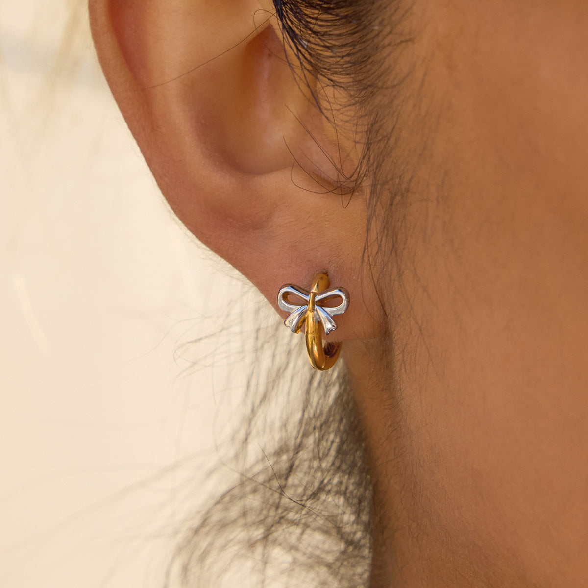 Damen Creolen mit Schleifenmotiv aus hypoallergenem Edelstahl Shop Nory