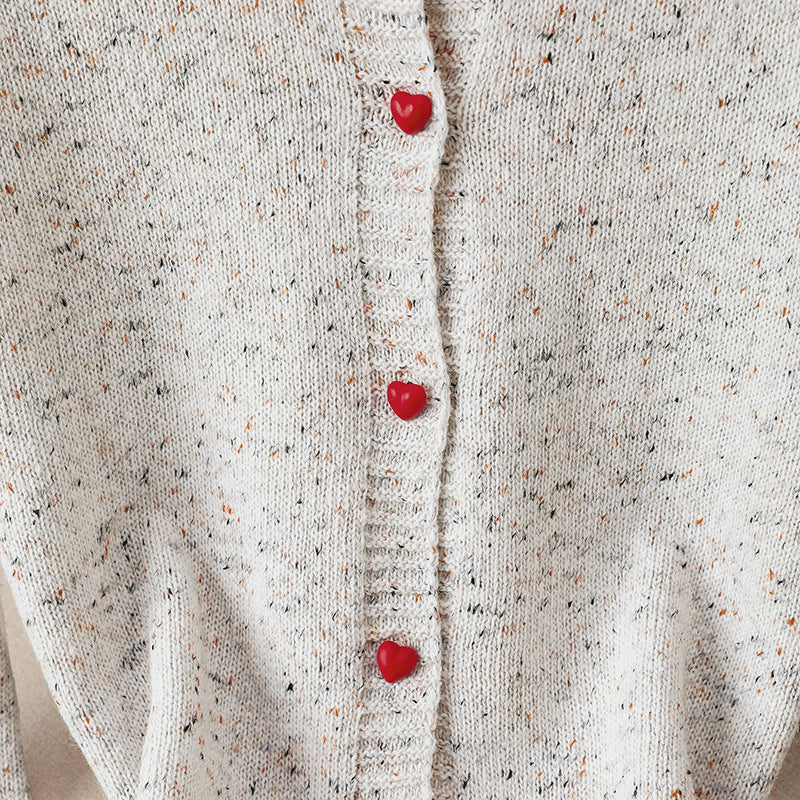 Damen Gesprenkelte Strickjacke mit Kontrastkanten und Herzknöpfen Shop Nory