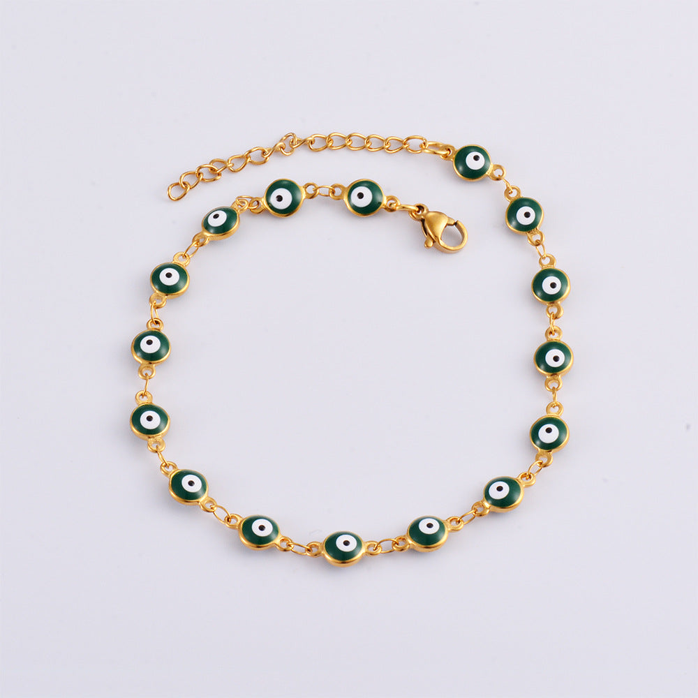 Damen Armband mit schützenden Augenmotiven und feinem Goldglanz Shop Nory