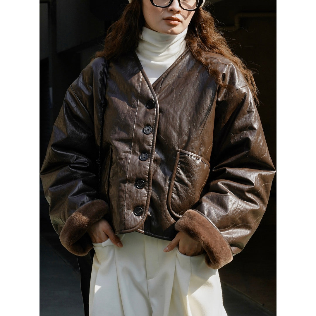 Damen Boxy Lederimitat-Jacke mit gesteppter Optik und Teddy-Futter Shop Nory