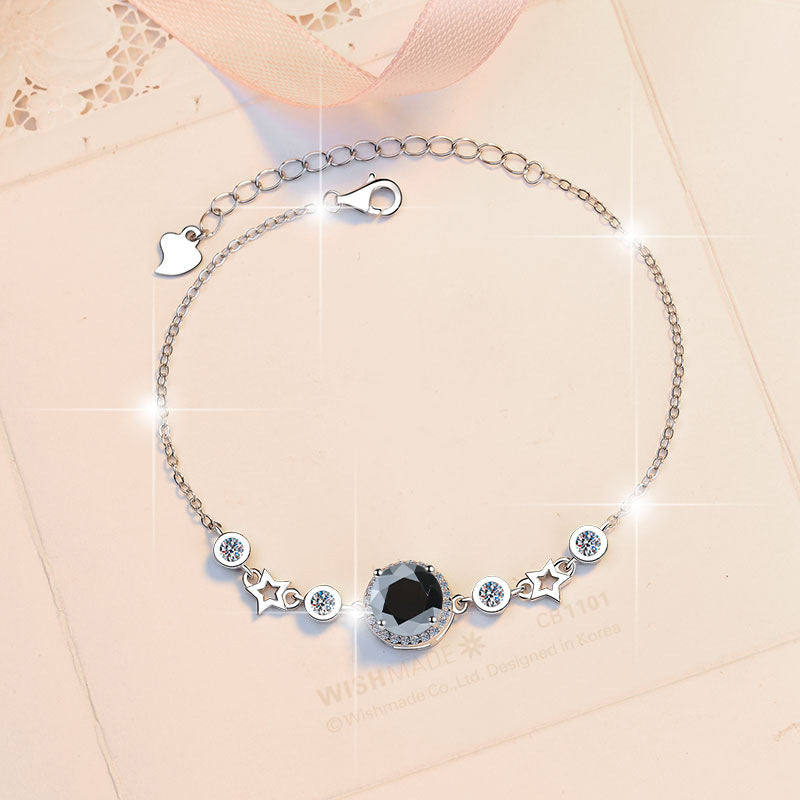 Damenarmband mit strahlendem Kristall und funkelnden Sternen Shop Nory