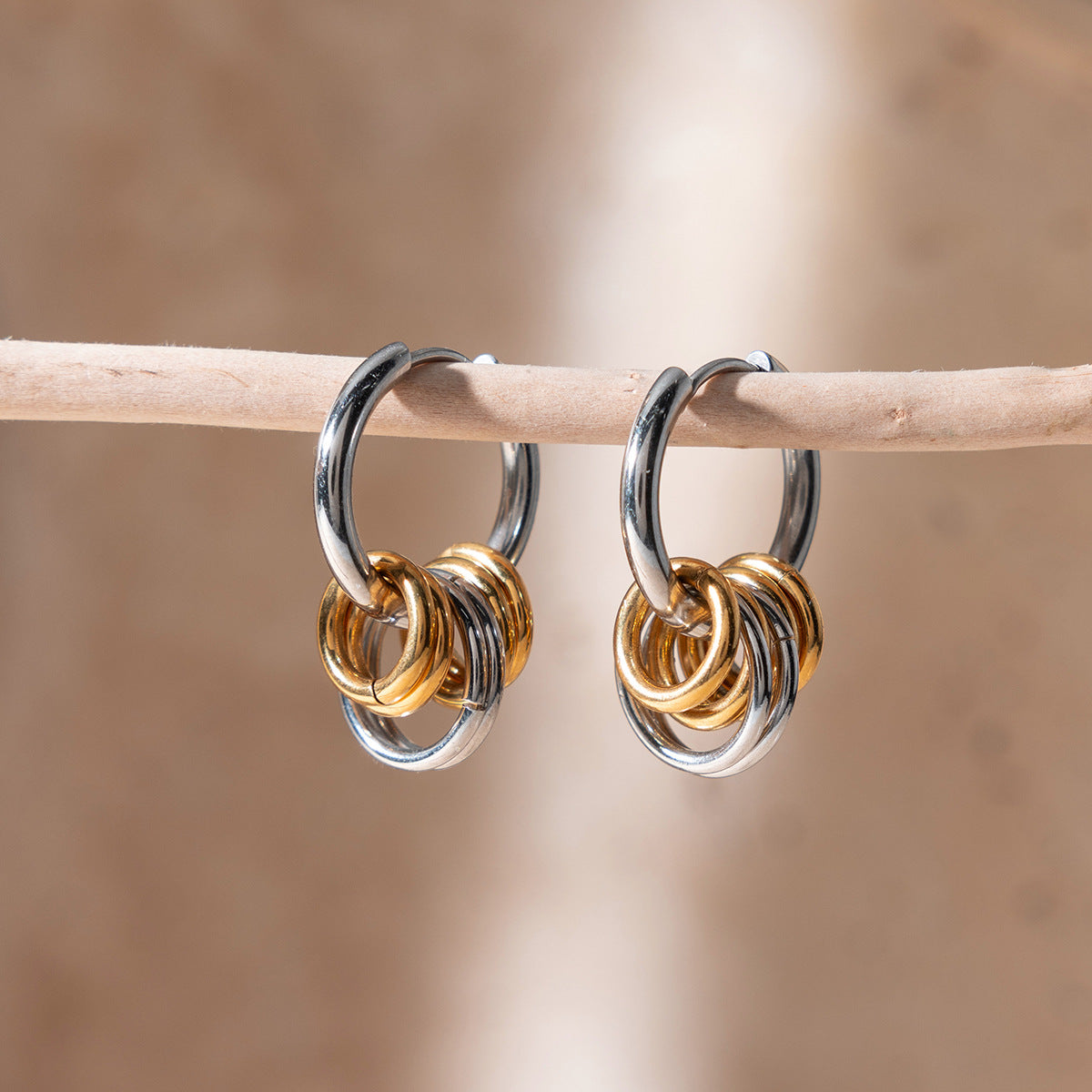 Damen Creolen mit modernem Spiral-Design aus hypoallergenem Edelstahl Shop Nory