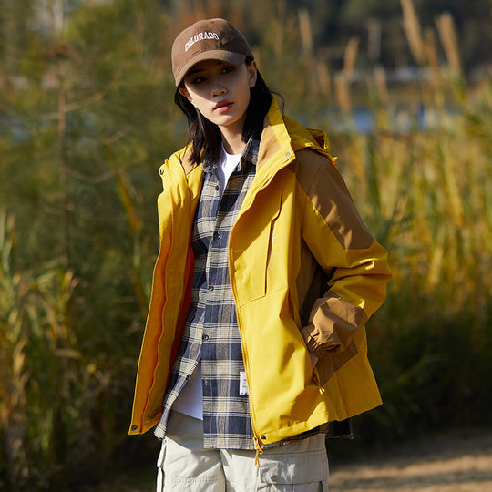 Damen zweilagige wasserabweisende Outdoorjacke mit Kapuze, Taillenregulierung und Kontrastbesätzen Shop Nory