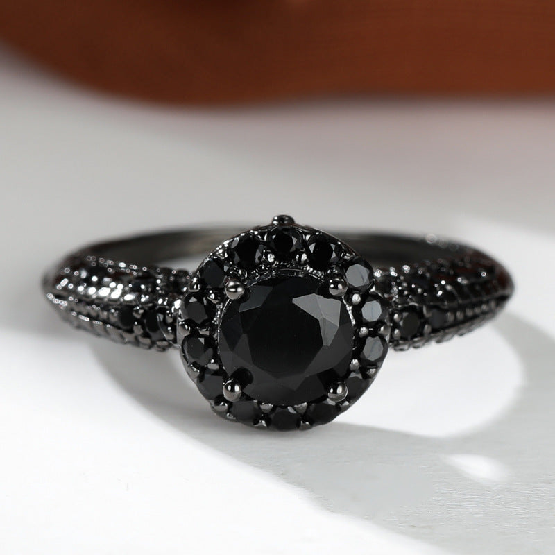 Damen Ring mit kunstvollem schwarzem Stein und filigraner Details Shop Nory