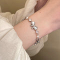 Damen Armband mit filigranem Schmetterlingsdesign und funkelnden Zirkonia Shop Nory