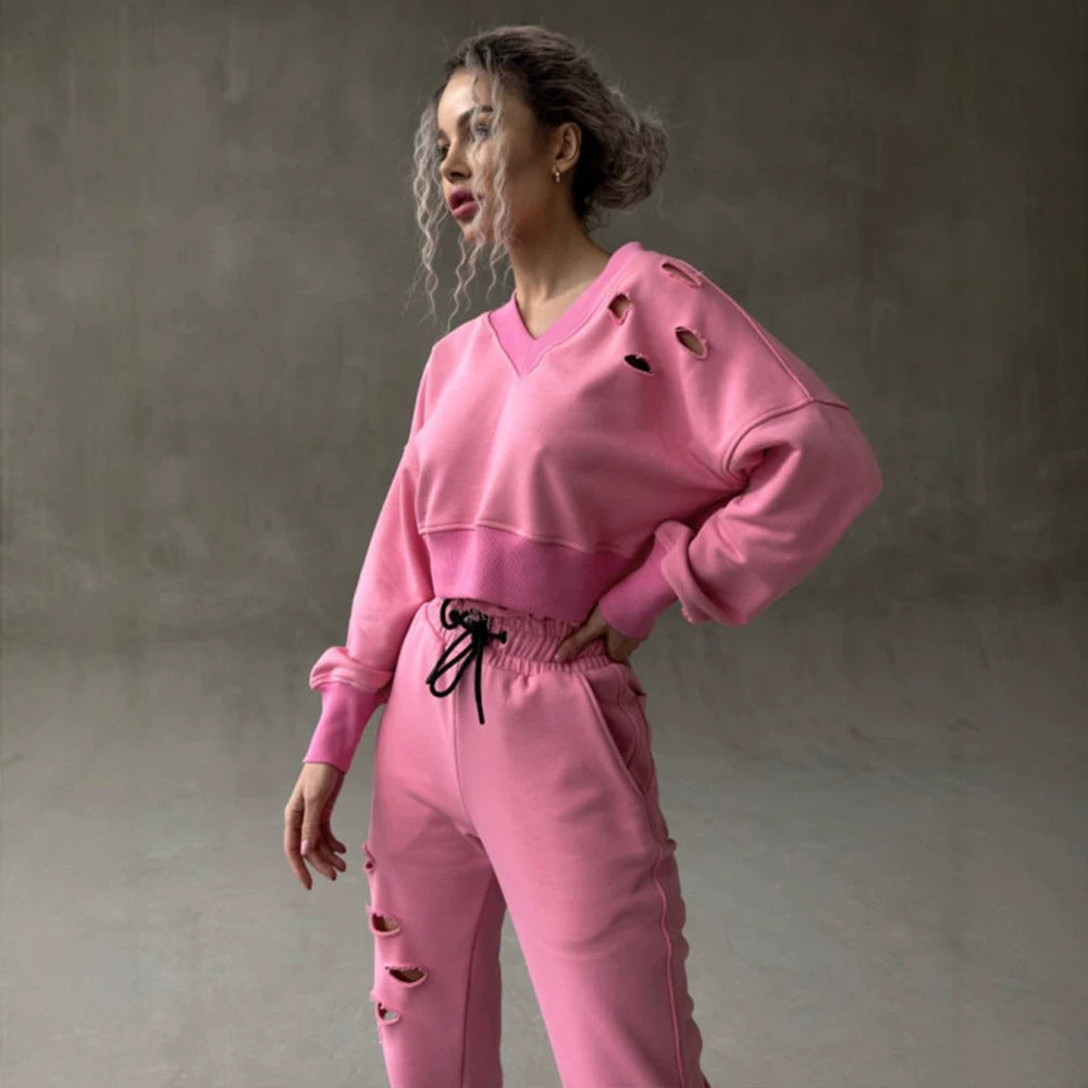 Damen kurzgeschnittenes Sweat-Set mit V-Ausschnitt, Rüschenbund Highwaist Jogginghose und Distressed-Details Shop Nory