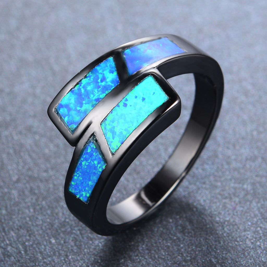 Damen Ring mit modernem, geometrischem Design und schimmernden Opal-Elementen Shop Nory