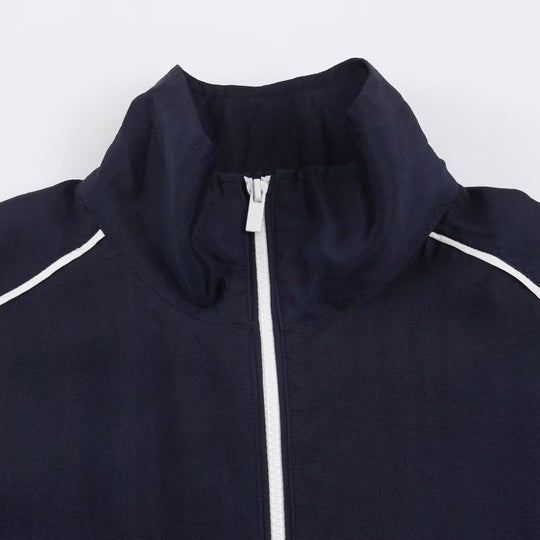 Damen Cropped Windbreaker-Jacke mit hohem Funnelkragen, Kontrastpaspel und elastischem Saum Shop Nory