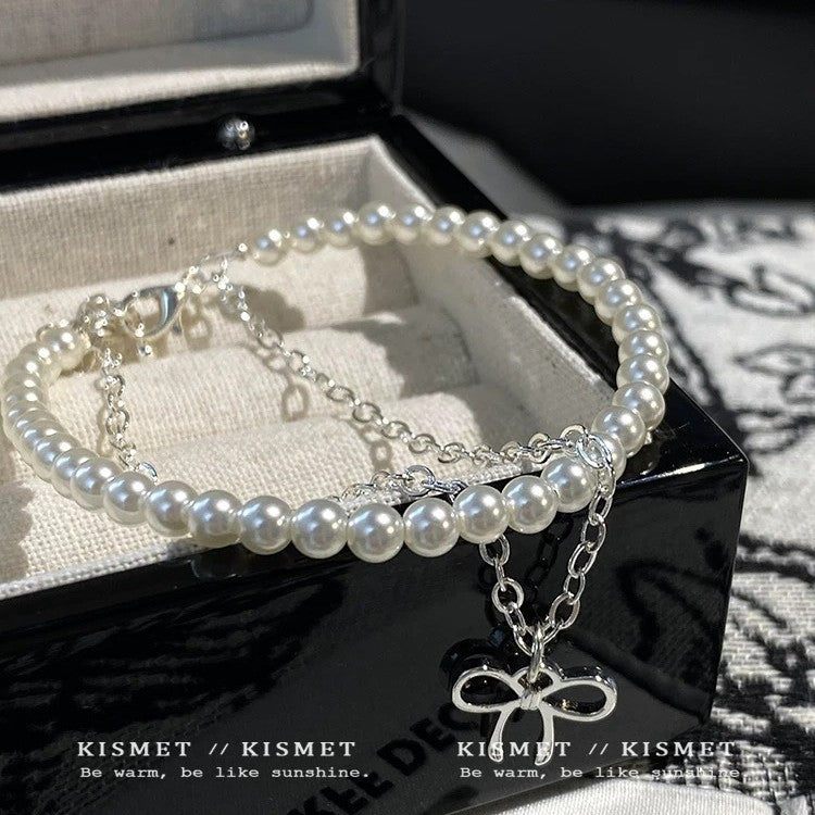 Damen Armband mit farbigen Halbedelsteinen und charmantem Schleifenanhänger Shop Nory