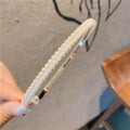 Damen Haarband mit perlensatter Oberfläche Shop Nory