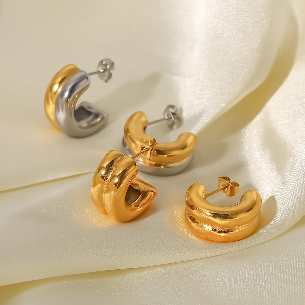 Damen Creolen mit elegantem Wellen-Design aus hochwertigem Edelstahl Shop Nory