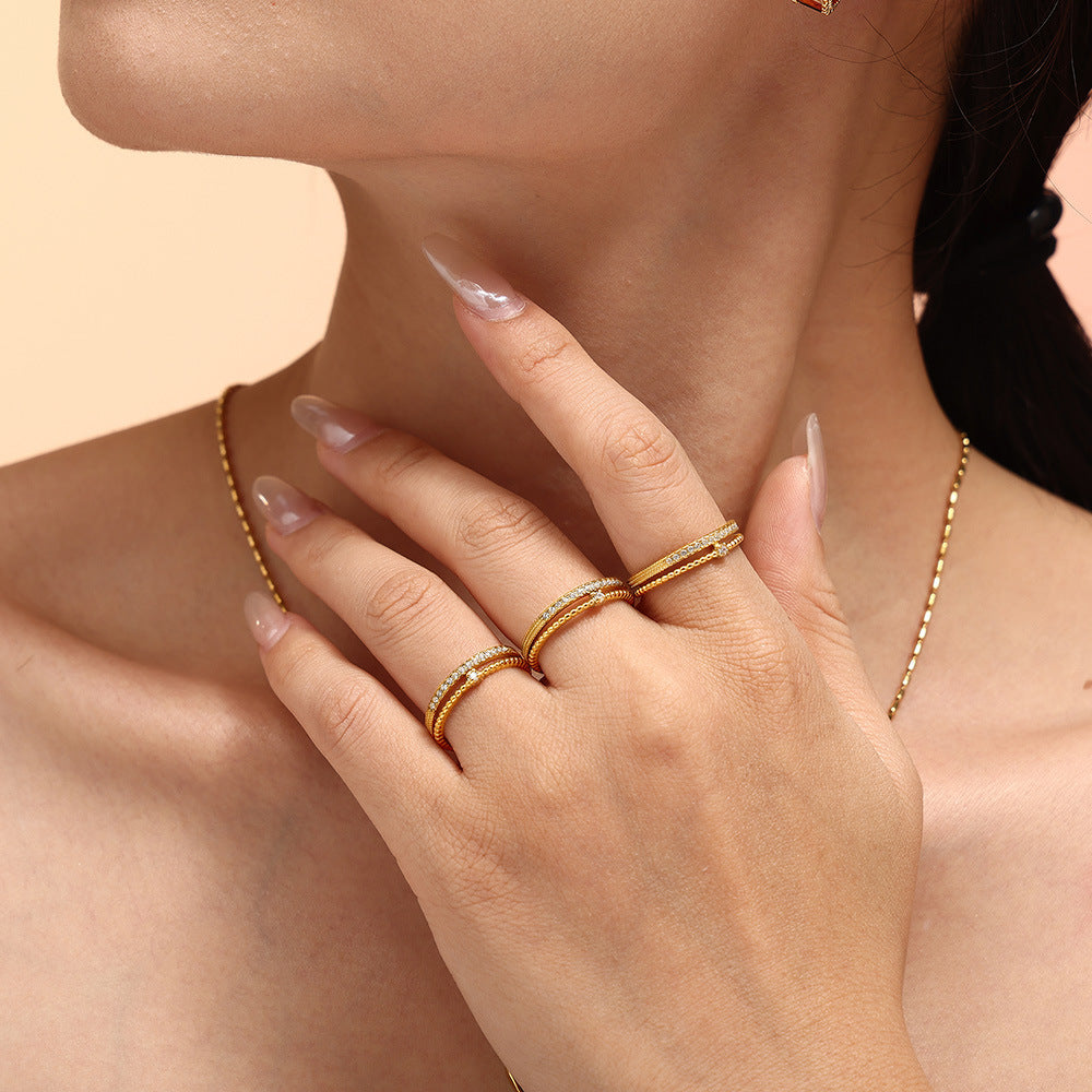 Damen Offener Ring aus Titanstahl mit Zirkonia und gewundenem Design Shop Nory