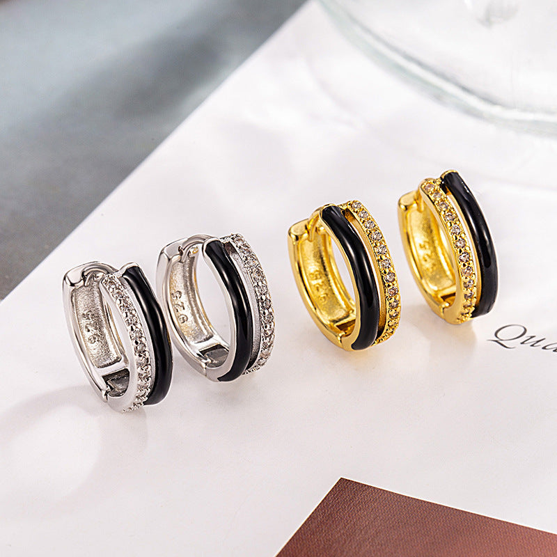 Damen Creolen mit elegantem Design und funkelnden Akzenten Shop Nory