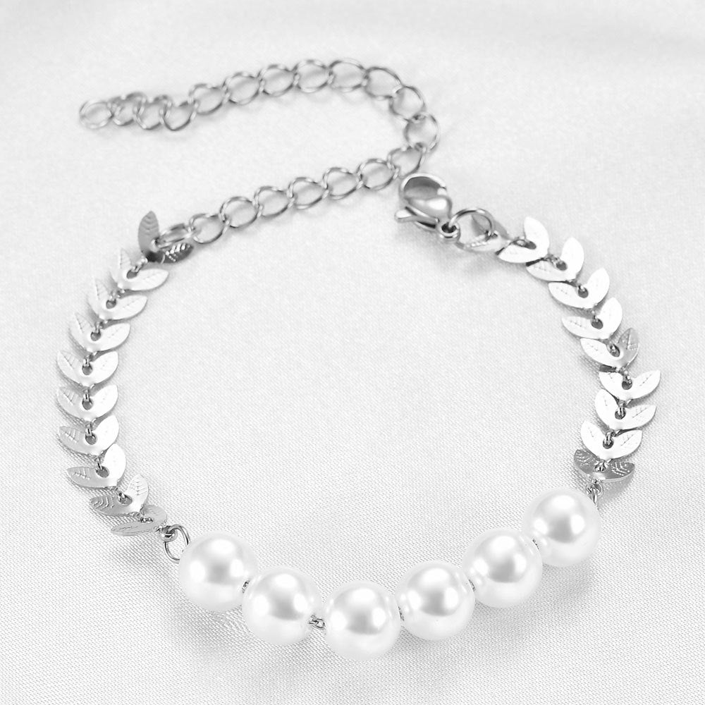 Damen Armreif mit elegantem Blattdesign und funkelnden Perlendetails Shop Nory