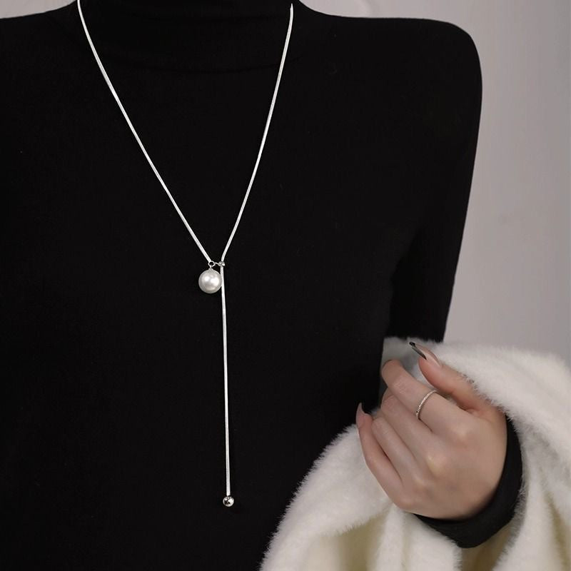 Damen Halskette mit elegantem Perlenanhänger und zartem Gliederdesign Shop Nory