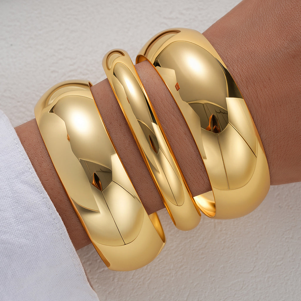 Damenarmreif mit geschwungenem Design und glänzender Oberfläche Shop Nory