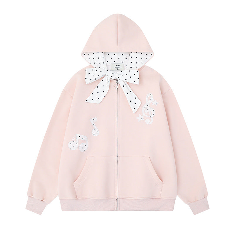 Damen Kapuzensweatjacke mit gepünktetem Kapuzenfutter, dekorativer Schleife und Notenmotiv Shop Nory