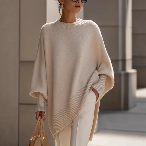 Damen nan Oversize Strickponcho mit asymmetrischem Saum und gerippten Ärmeln Shop Nory