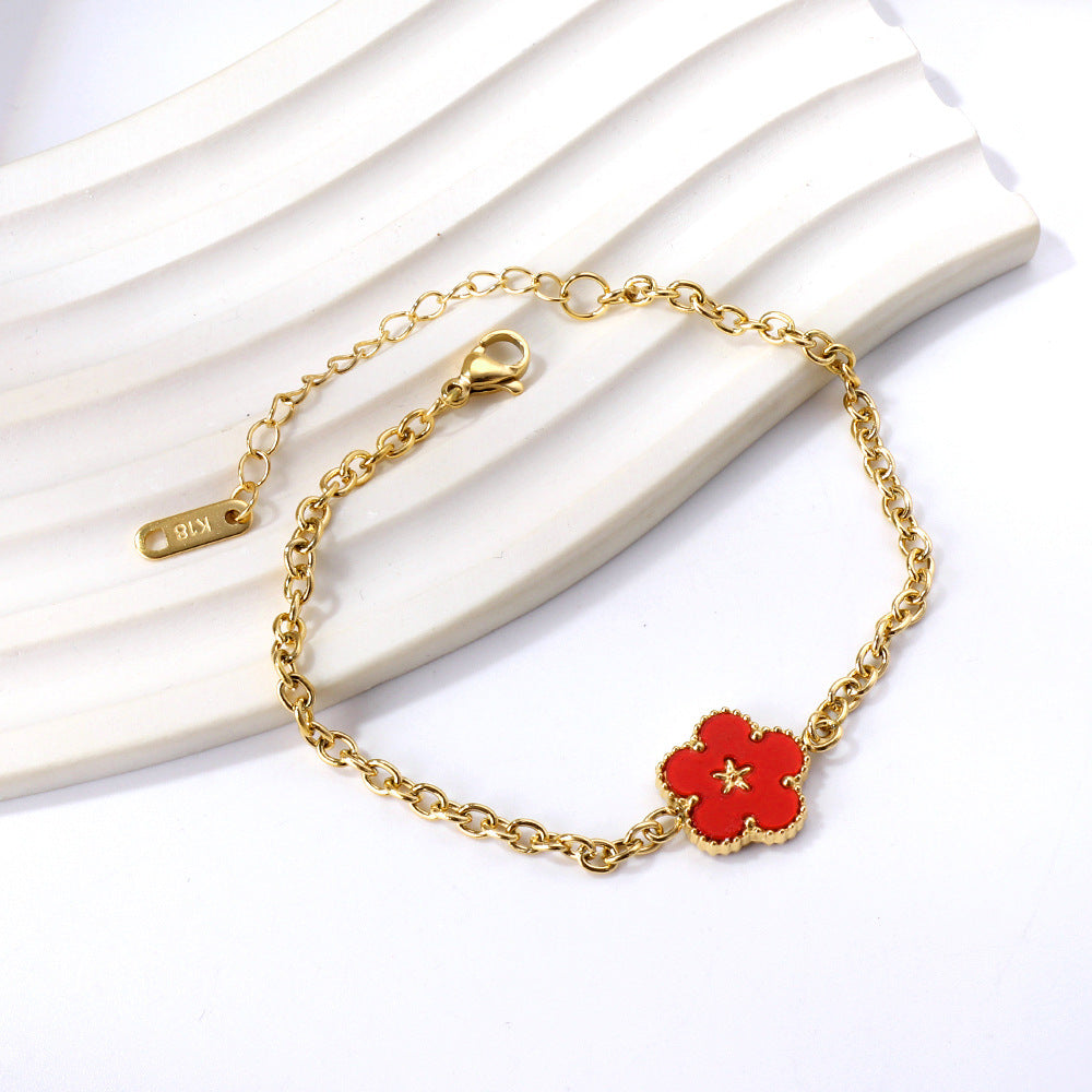 Damen Armband mit floralem Anhänger aus hochglanzpoliertem Edelstahl Shop Nory