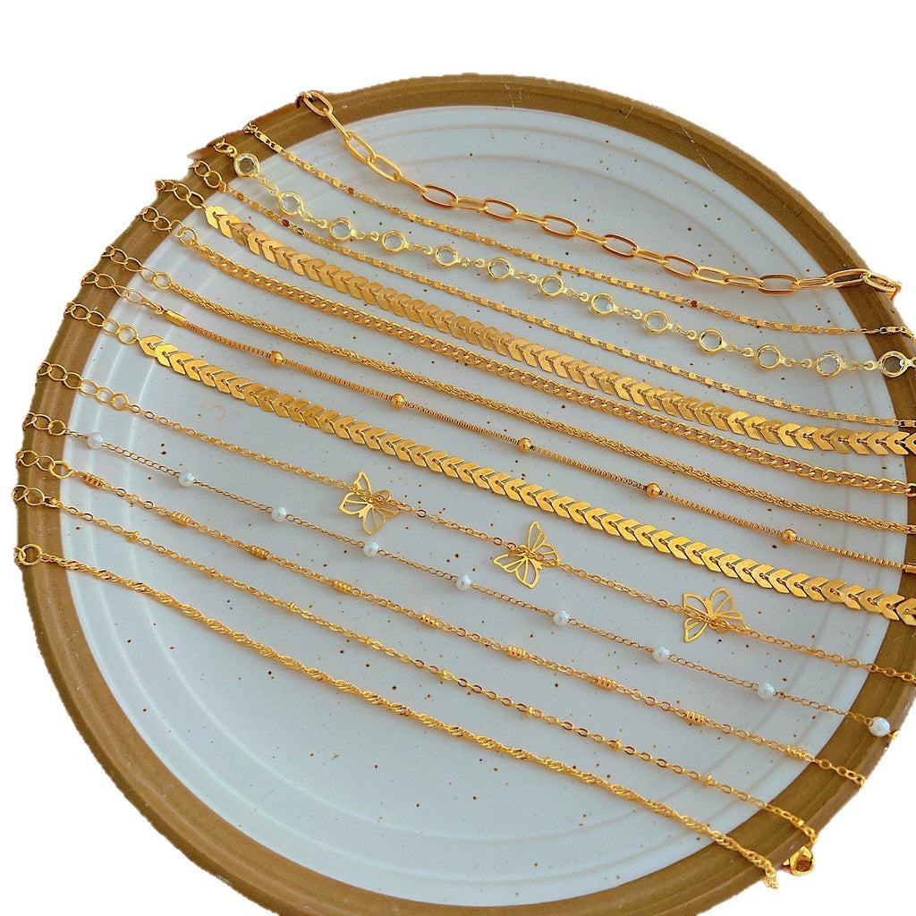 Damen Fußkettchen-Set mit feinen, goldenen Gliederketten Shop Nory