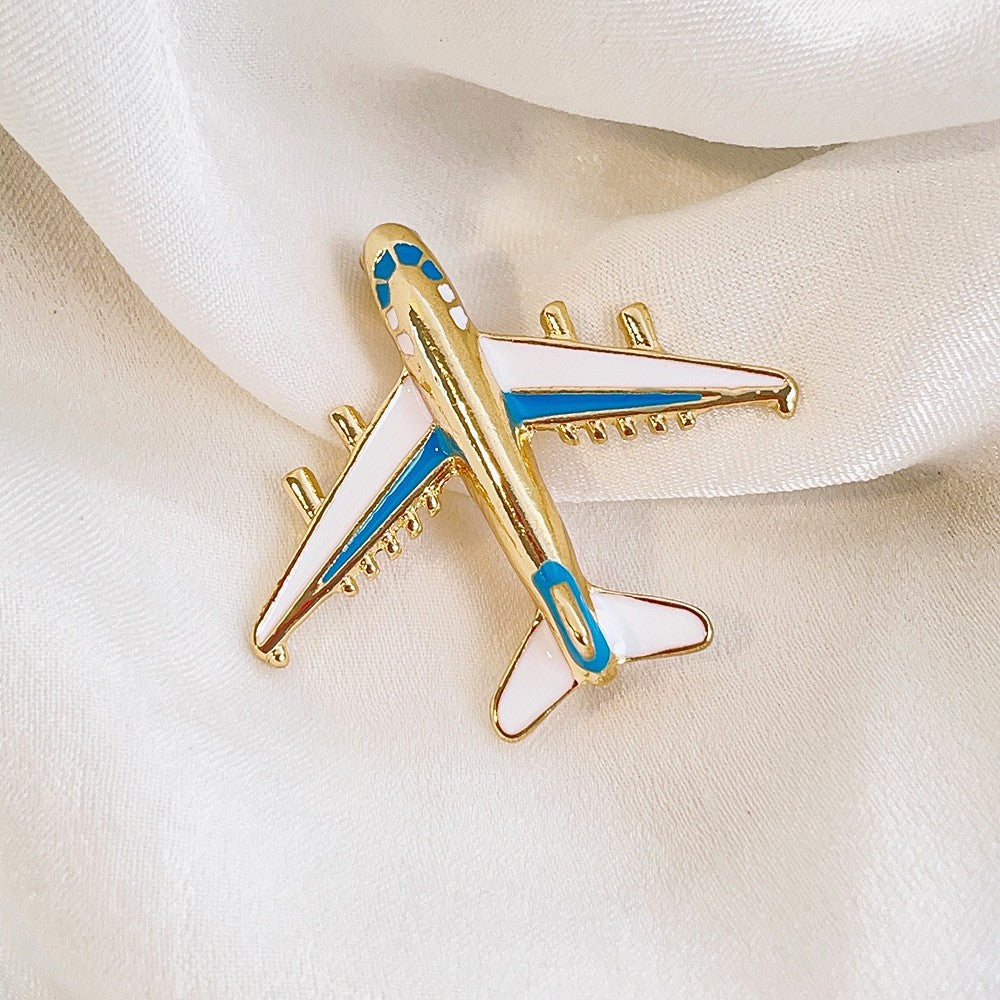 Elegante Flugzeugbrosche mit Kristallbesatz und Sicherem Nadelverschluss