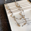 Damen Kette mit eleganten Perlen- und Metallakzenten Shop Nory