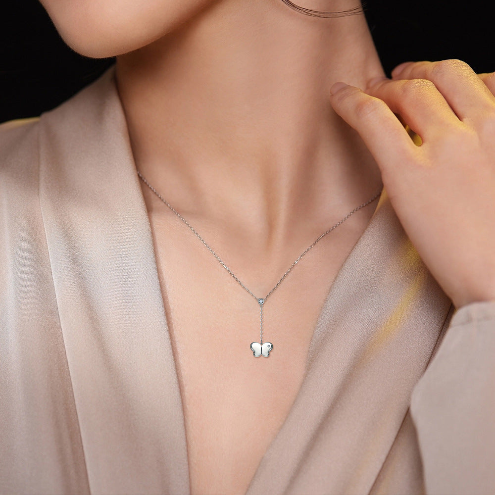 Damen Halskette mit Schmetterlingsdesign und funkelnden Kristallen Shop Nory