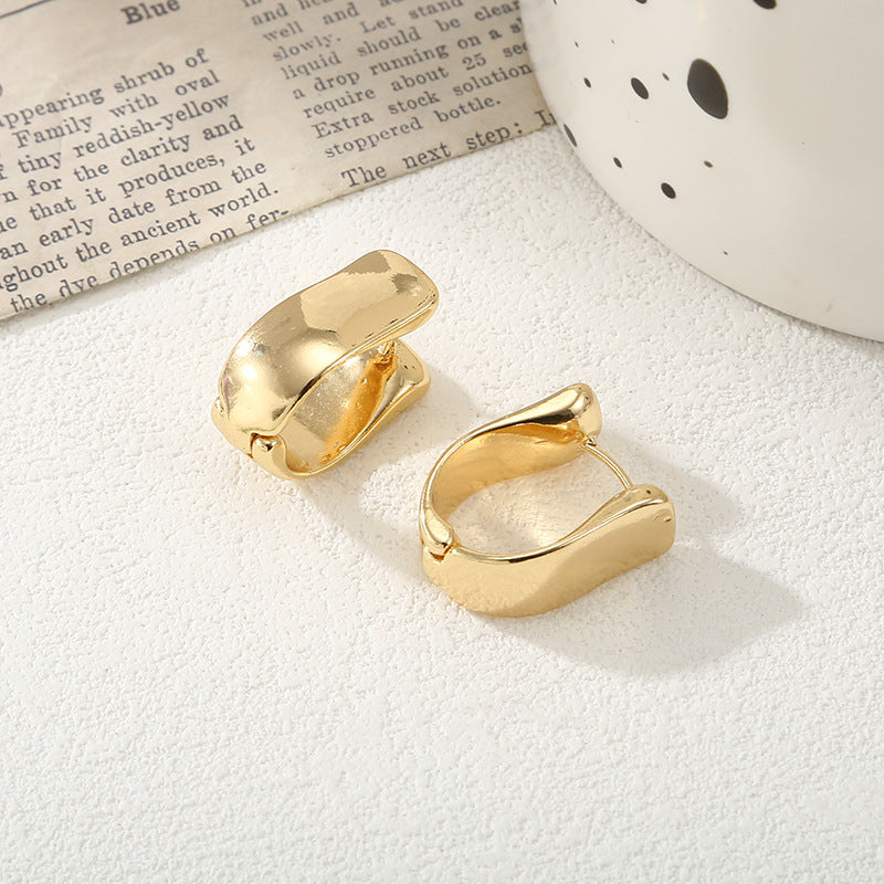 Damen Ohrringe mit elegantem, geschwungenem Design Shop Nory