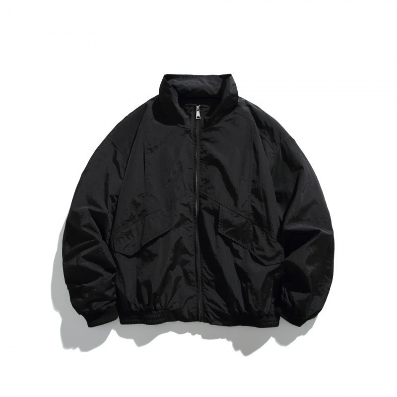 Unisex Leichte Nylon‑Bomberjacke mit Stehkragen, durchgehendem Reißverschluss und elastischem Saum Shop Nory