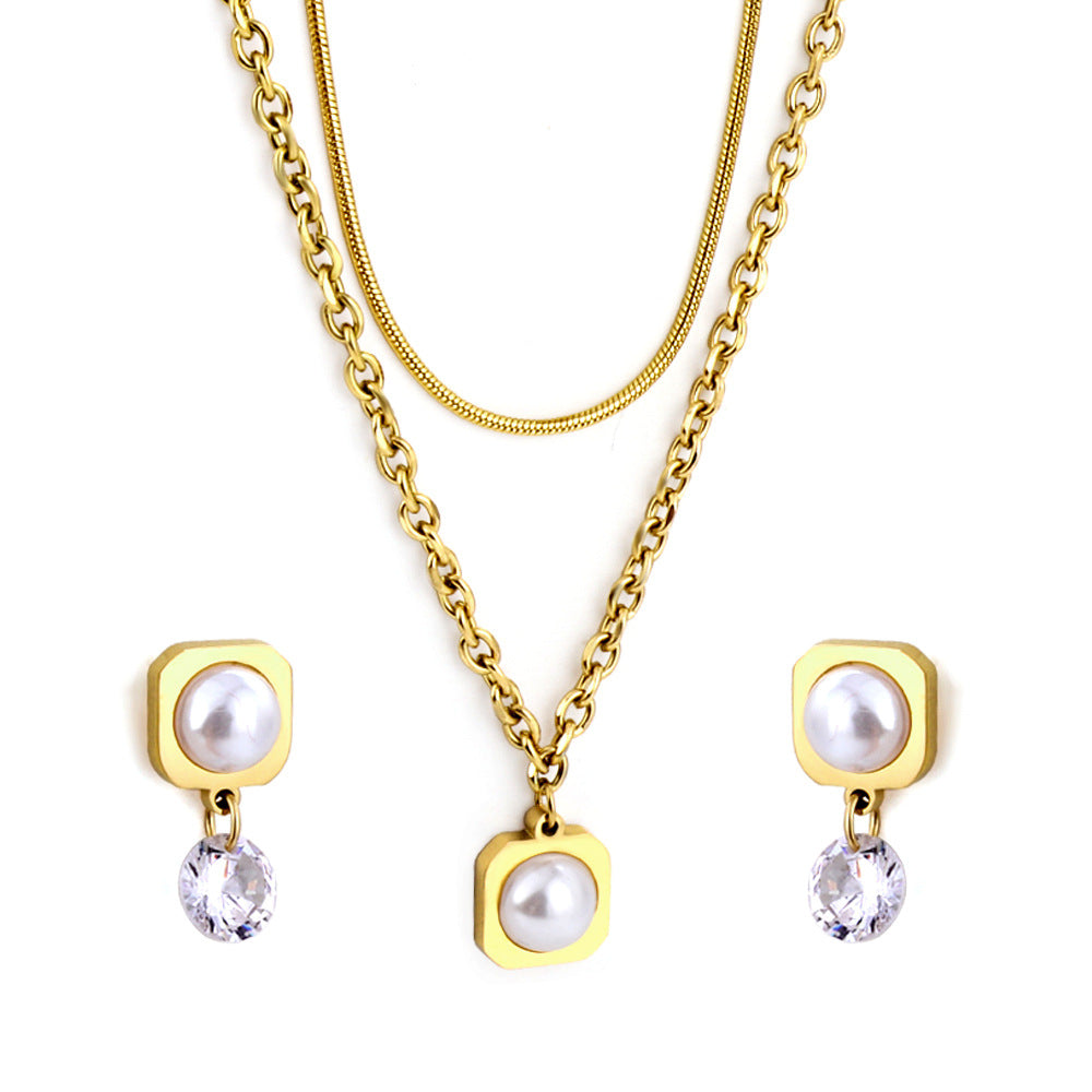Damen Schmuckset mit modernem, eleganten Perlenanhänger und Ohrringen Shop Nory