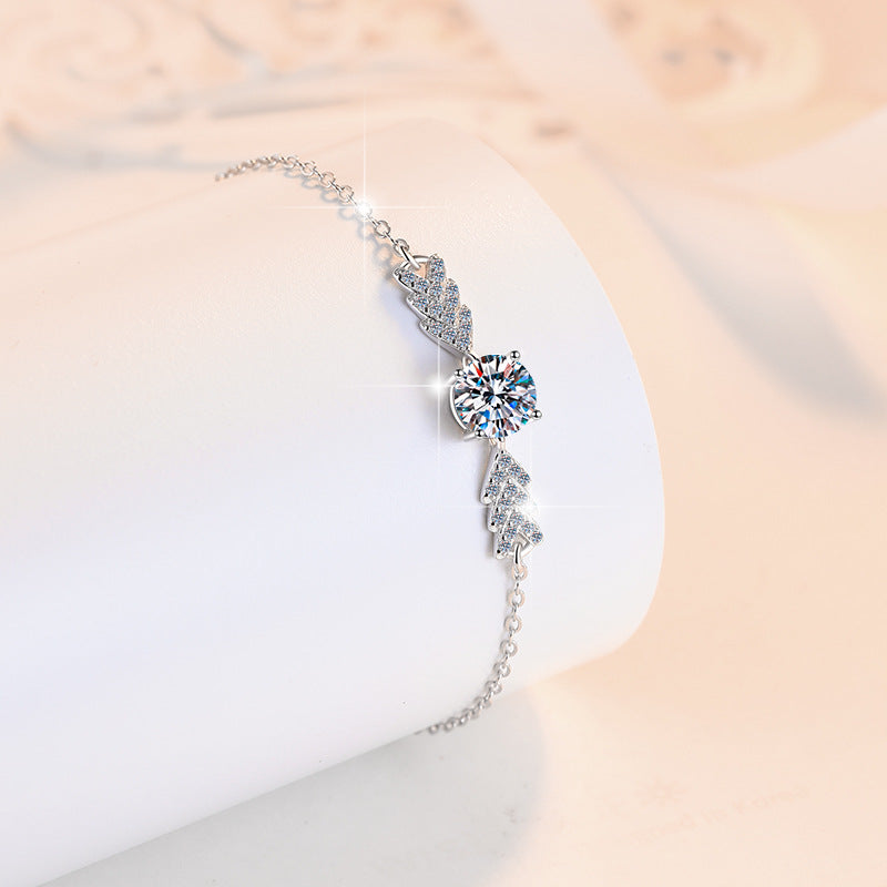 Damenarmband mit funkelndem Zirkonia und elegantem Blattdesign Shop Nory