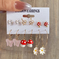 Damen Ohrringe Set mit verspielten Designs und funkelnden Elementen Shop Nory