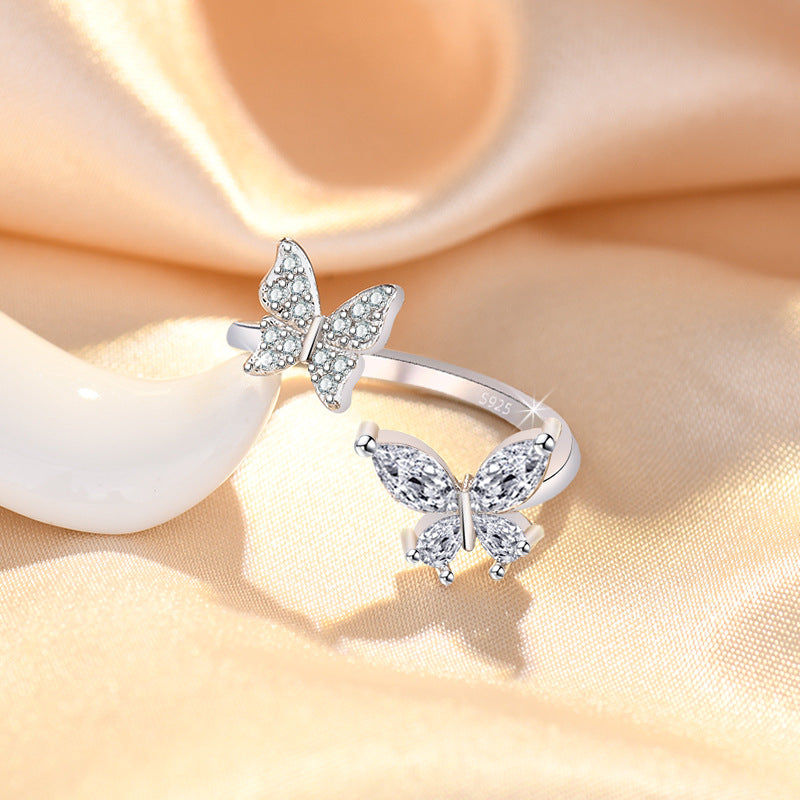 Damenring mit elegantem Schmetterlingsdesign und funkelnden Zirkonia Shop Nory
