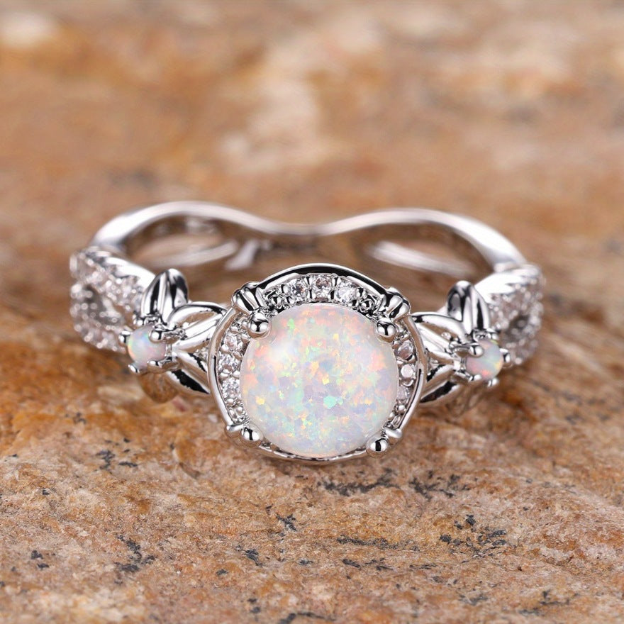 Damen Ring mit filigranem Opalmotiv und funkelnden Zirkonia Shop Nory