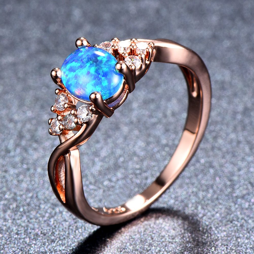 Damen Ring mit schimmerndem Opal und filigranen Zirkonia-Details Shop Nory