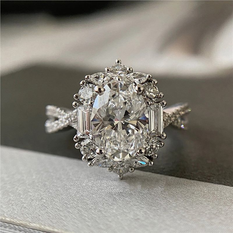 Damen Verlobungsring mit kunstvollem, floralen Design und funkelnden Zirkonia Shop Nory