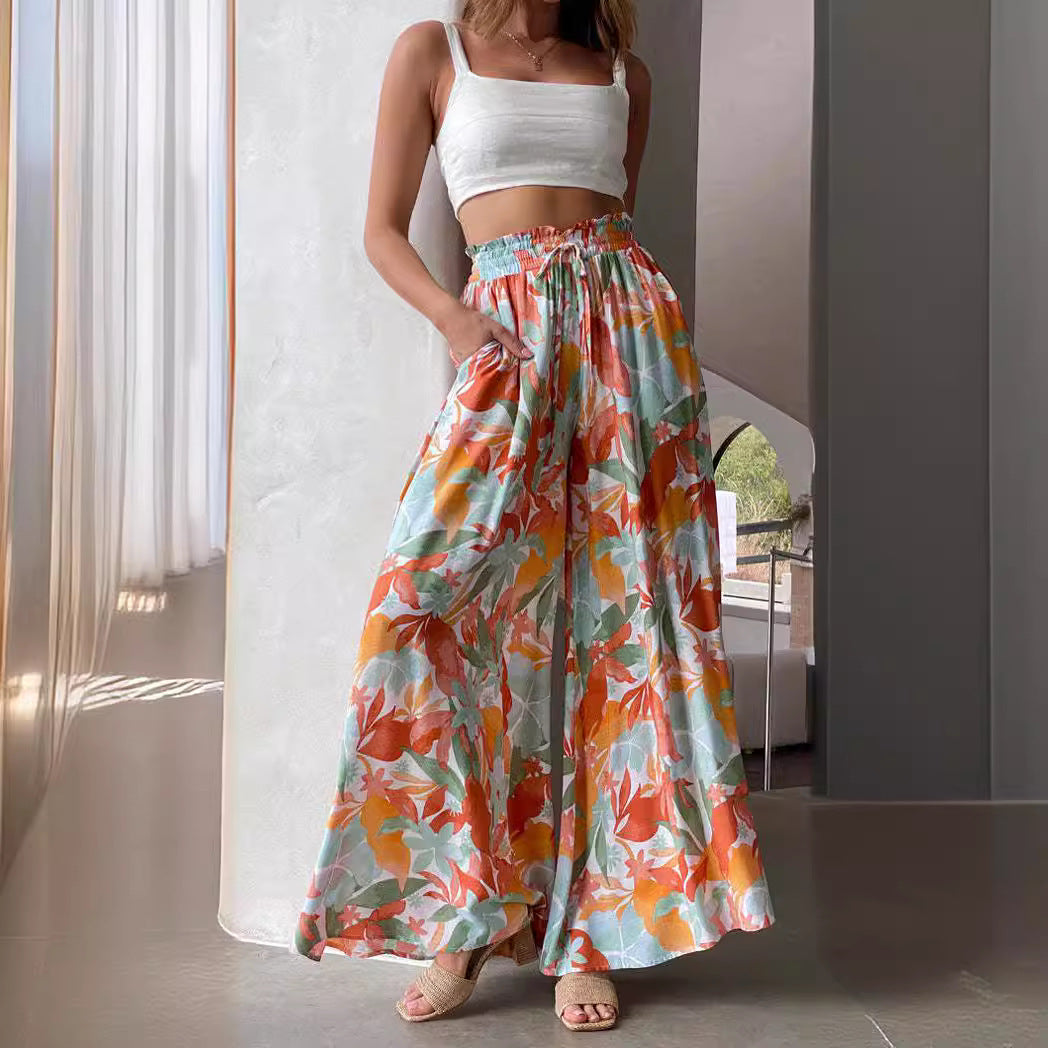 Damen Weite Sommerhose mit buntem Blumenmuster Shopnory