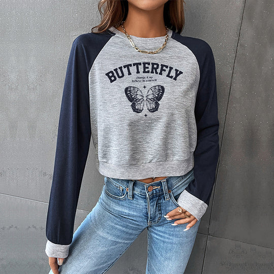 Damen Cropped Raglan-Sweatshirt mit Schmetterling-Print, geripptem Saum und lässiger Passform Shop Nory