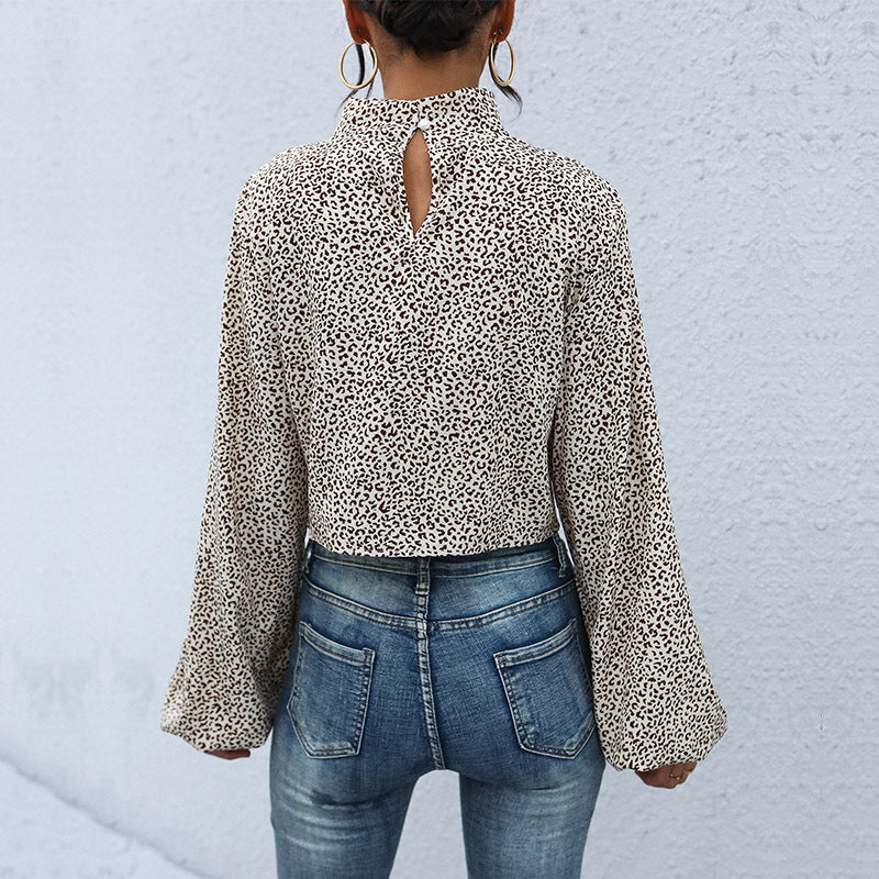 Damen Kurzbluse mit Drehfront, Stehkragen, Ballonärmeln und Animal‑Muster Shop Nory