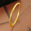 Frauen intricately designed gold bangle bracelet Shop Nory