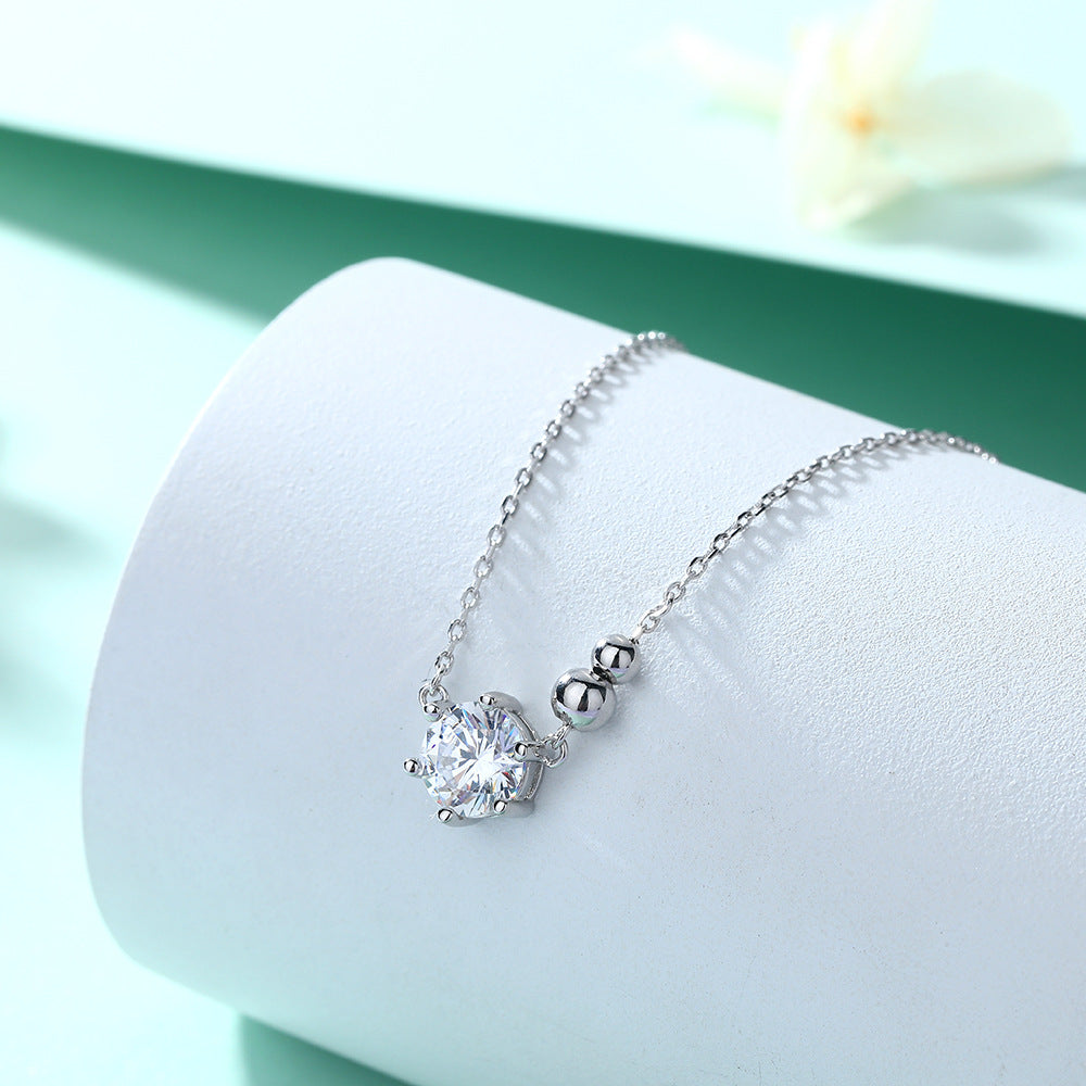 Damen Halskette mit funkelndem Zirkonia-Anhänger und eleganter Kettenstruktur Shop Nory