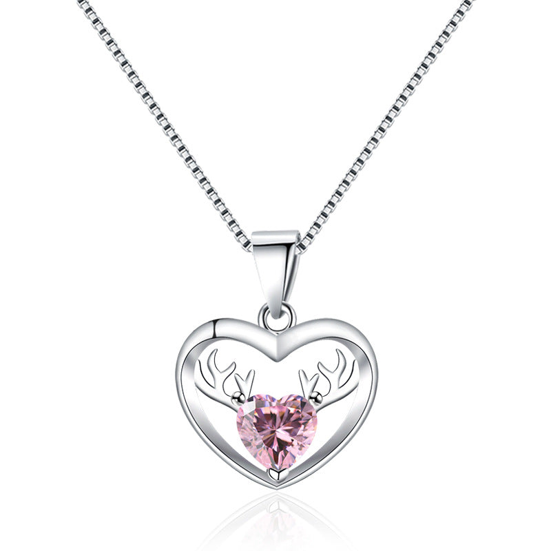 Damen Halskette mit herzförmigem Anhänger und eleganten Hirschakzenten Shop Nory