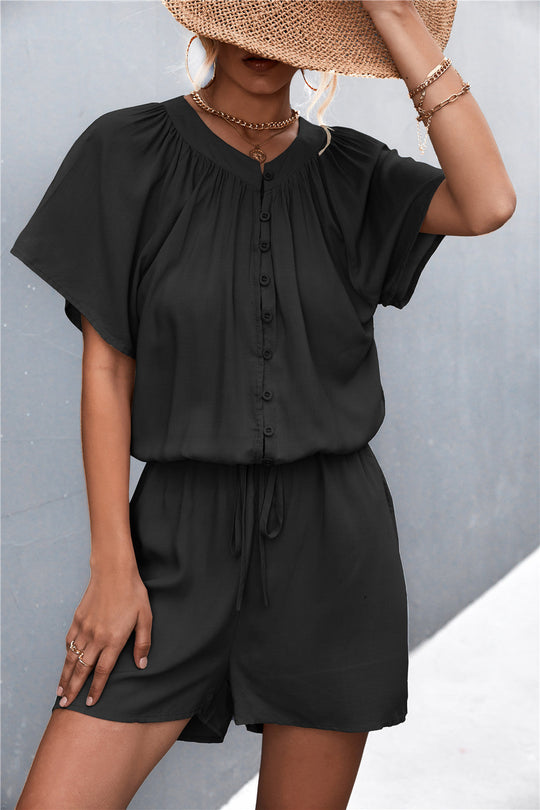 Damen Jumpsuit mit elastischem Bund und knopfverzierter Front