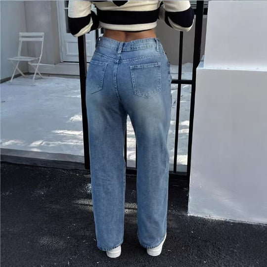 Damen hochtaillierte Relaxed‑Straight Denim‑Jeans mit weitem Bein und dezenten Destroy‑Details Shop Nory